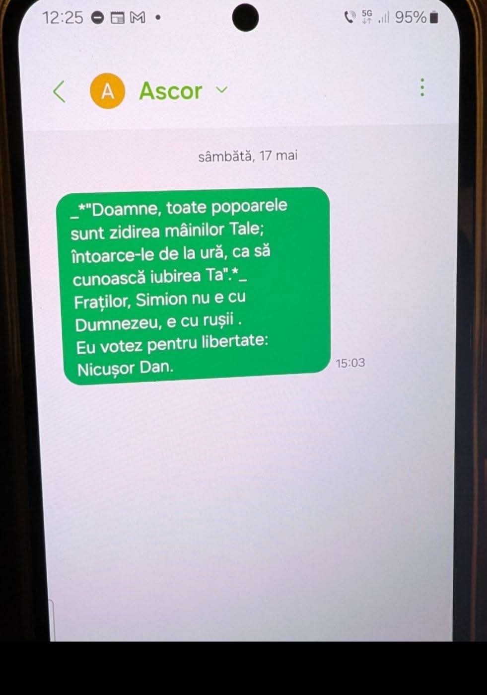Un mesaj politic sau un text nesolicitat (SMS/WhatsApp) trimis de o organizație.
